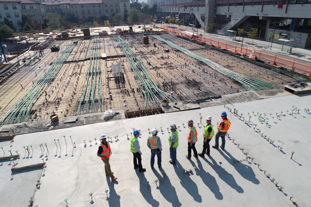 Construction team of workers on site